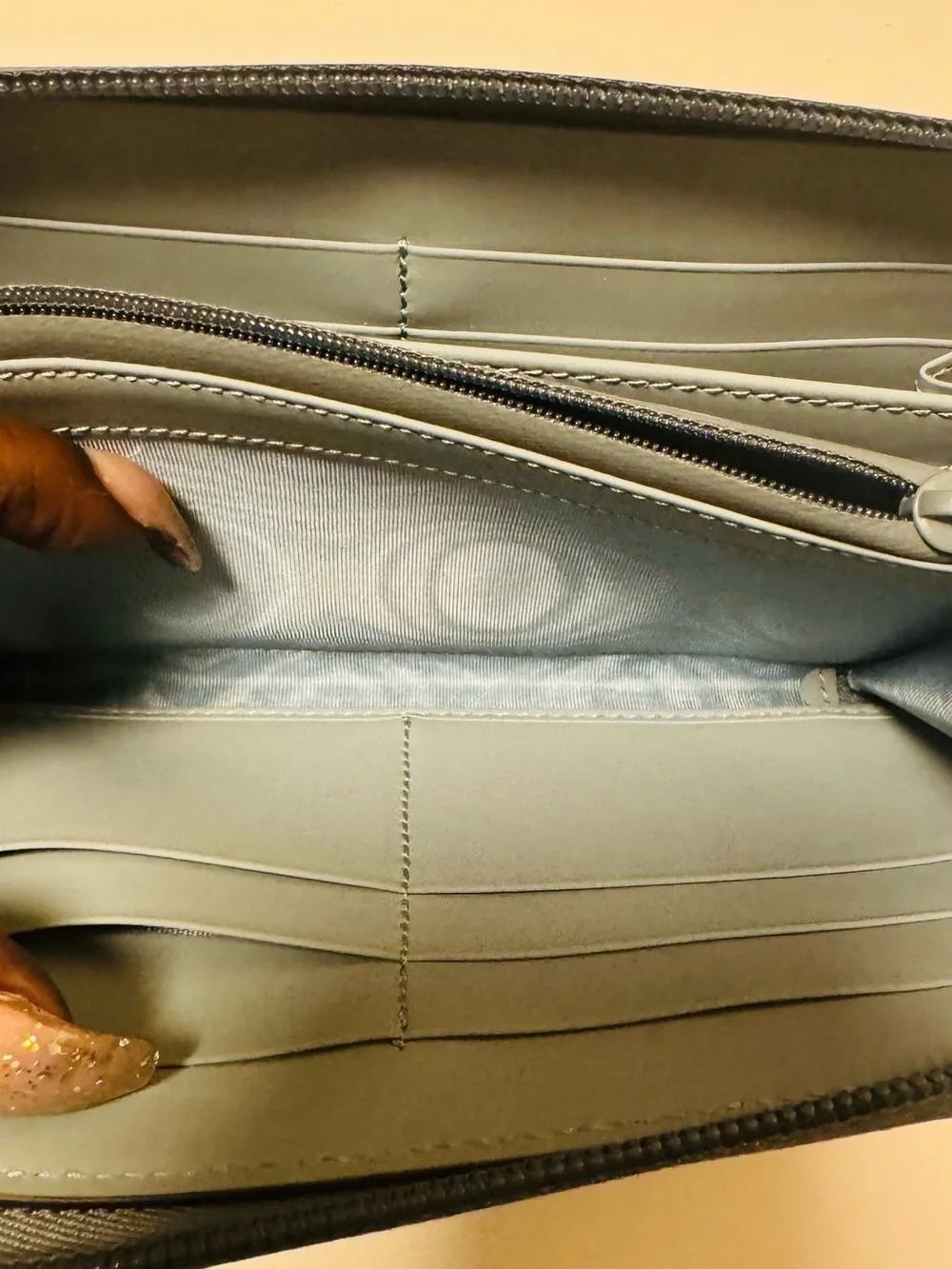 Gucci Light Blue Embossed GG Zip-Around Wallet